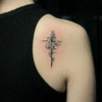 Feminine Cross with Flower Tattoo