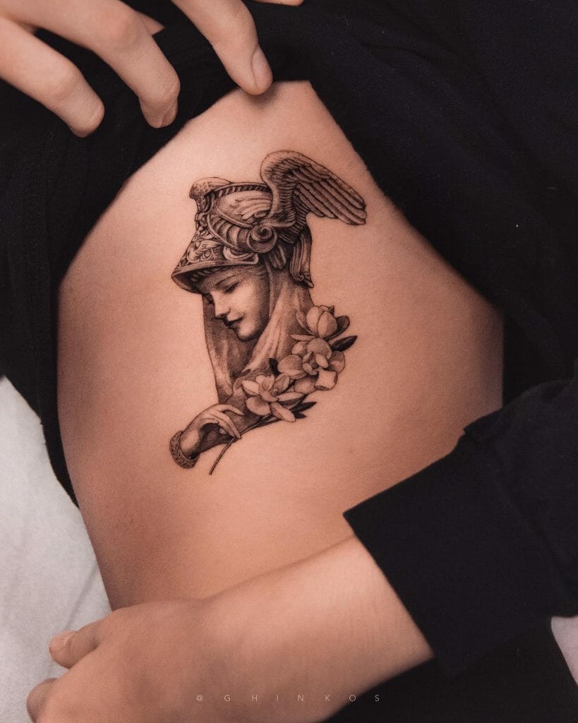 Athena Under Breast Tattoo