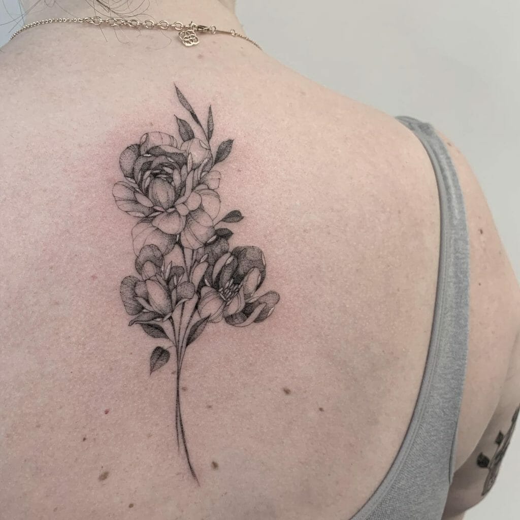 Awesome Magnolia Tattoo Design For Your Back