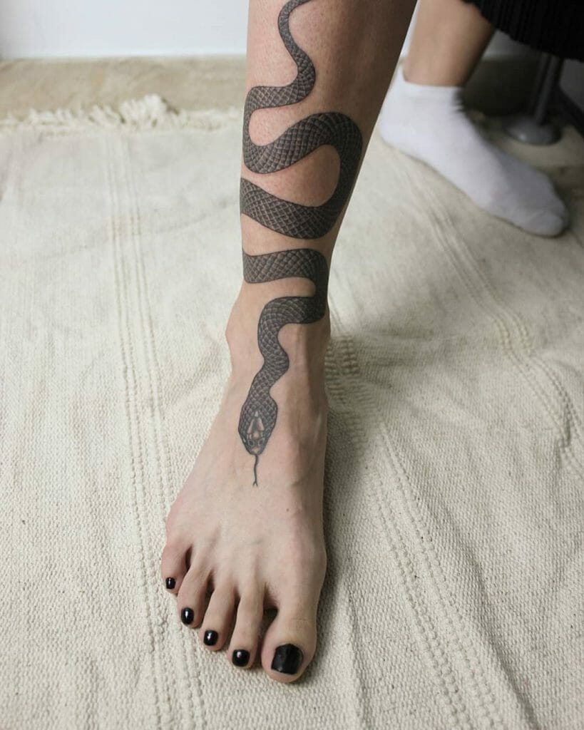 Badass Snake Wrapped On Ankle Tattoo