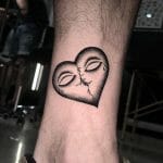 Best Broken Heart Face Tattoo
