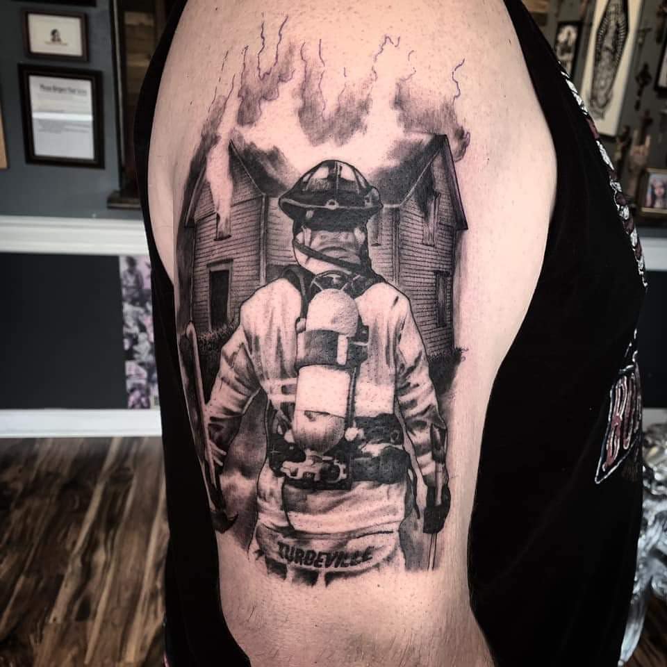 Black Ink Firefighter Tattoo