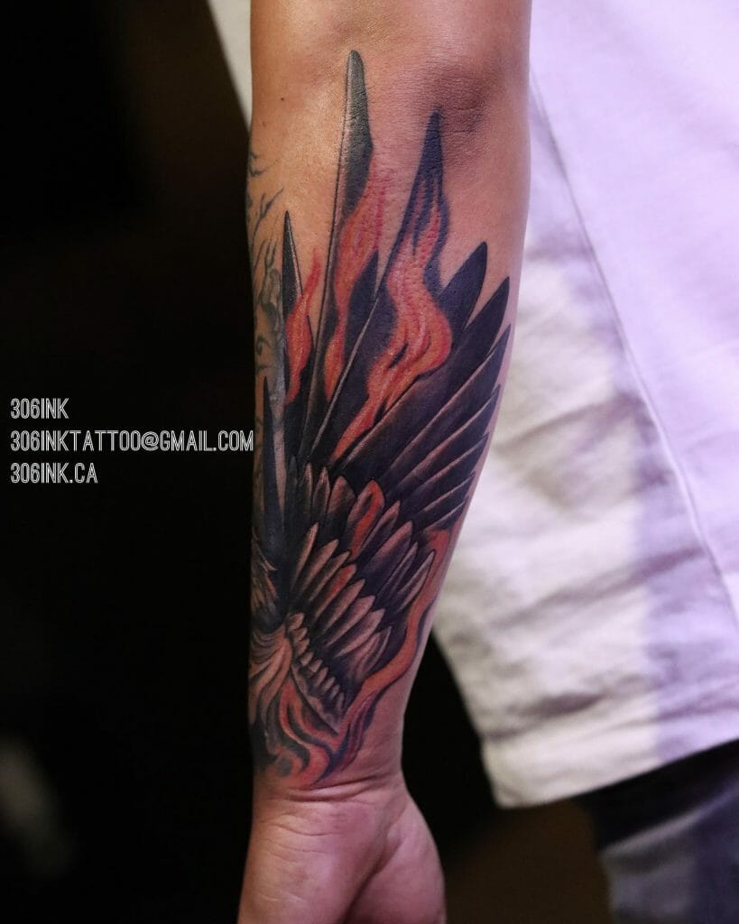 Burning Wing Forearm Tattoo