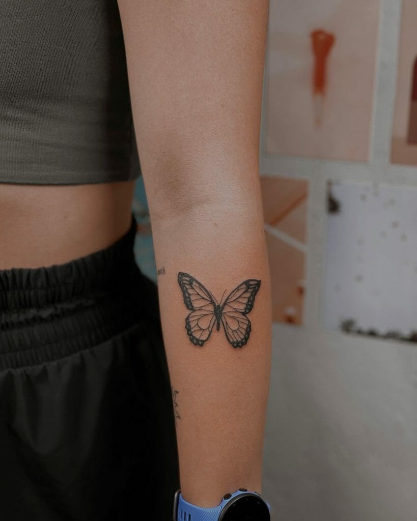 Cute Butterfly Tattoo In Black