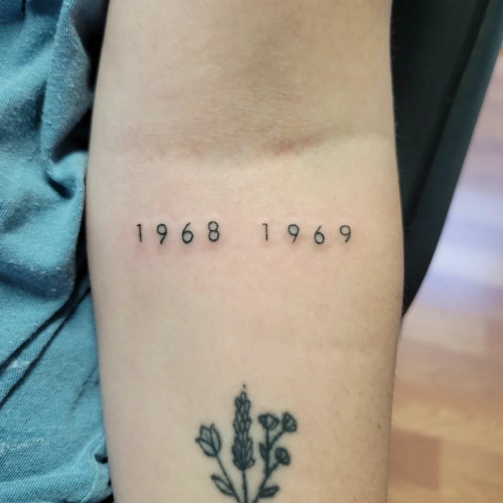 Date Tattoos On Forearm With Small Flower