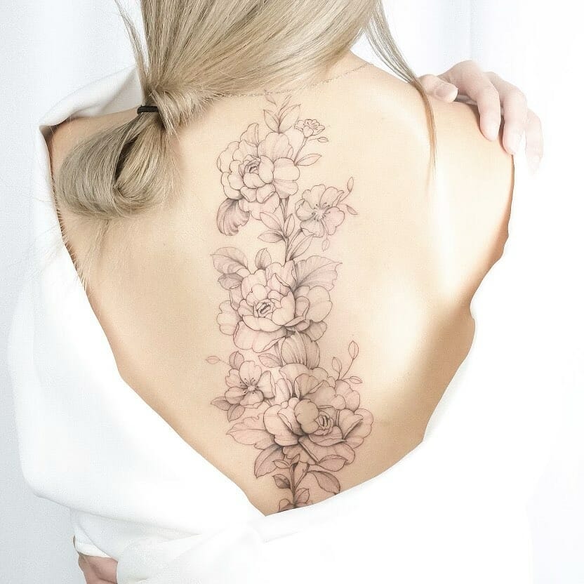 Delicate Flower Spine Tattoo Ideas