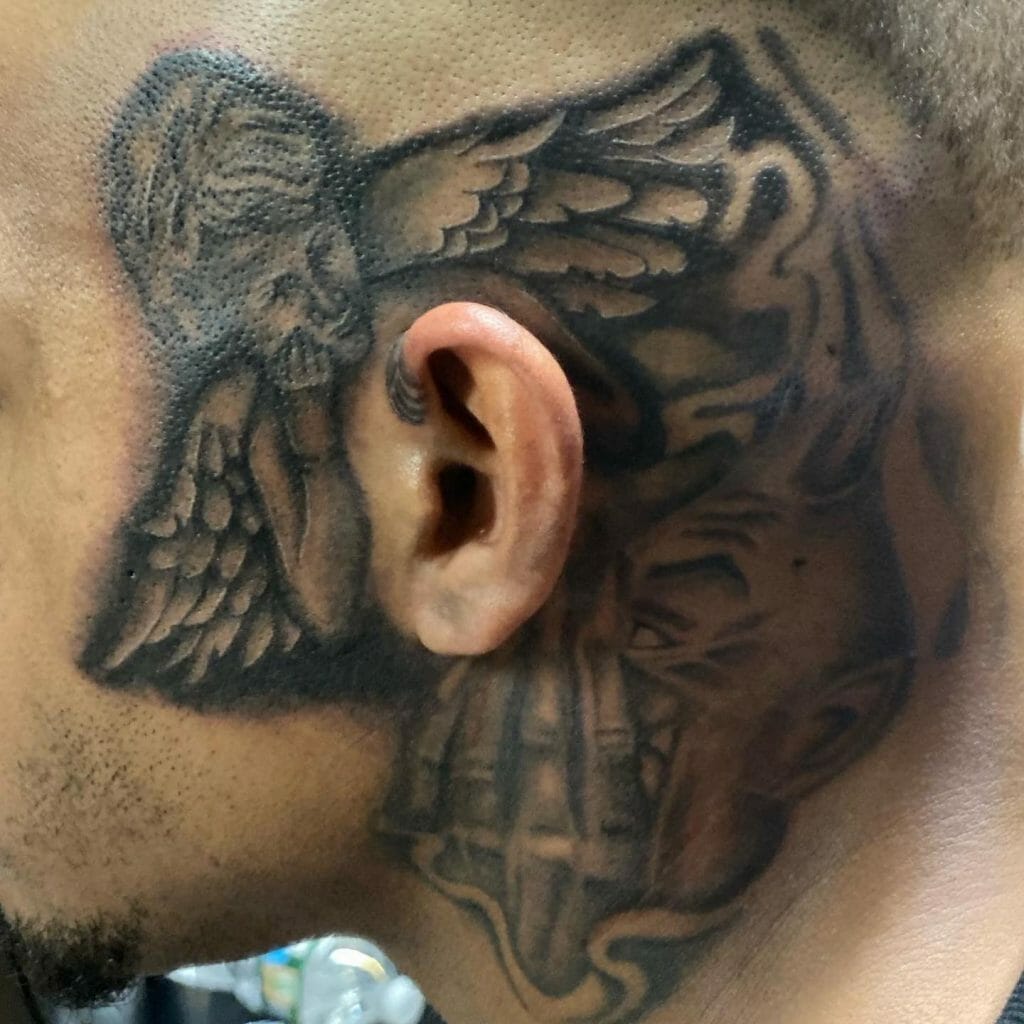Devil And Angel Whispering In Ear Tattoo
