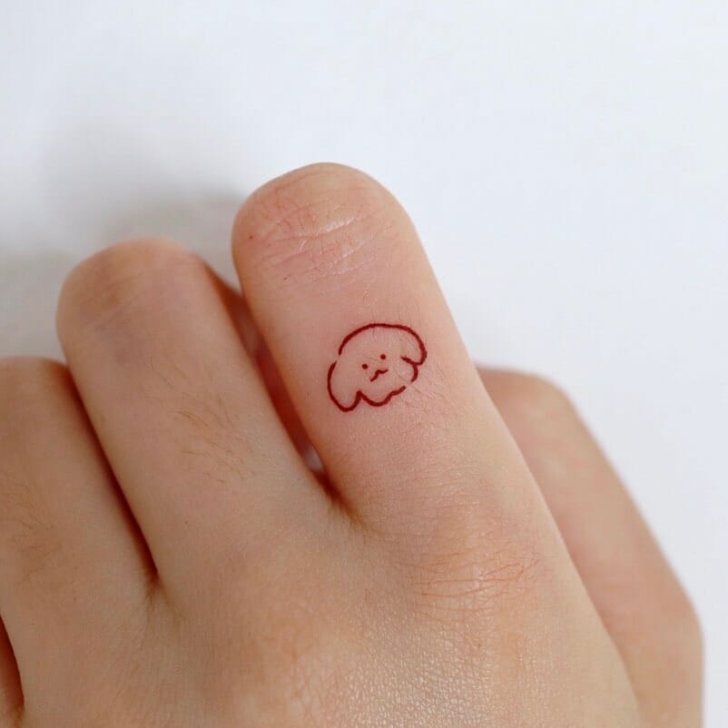 Finger Dog Outline Tattoo