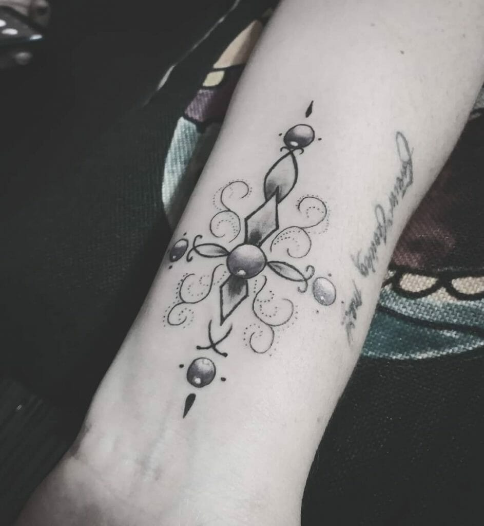 Girly Cross Tattoo On Wrist
