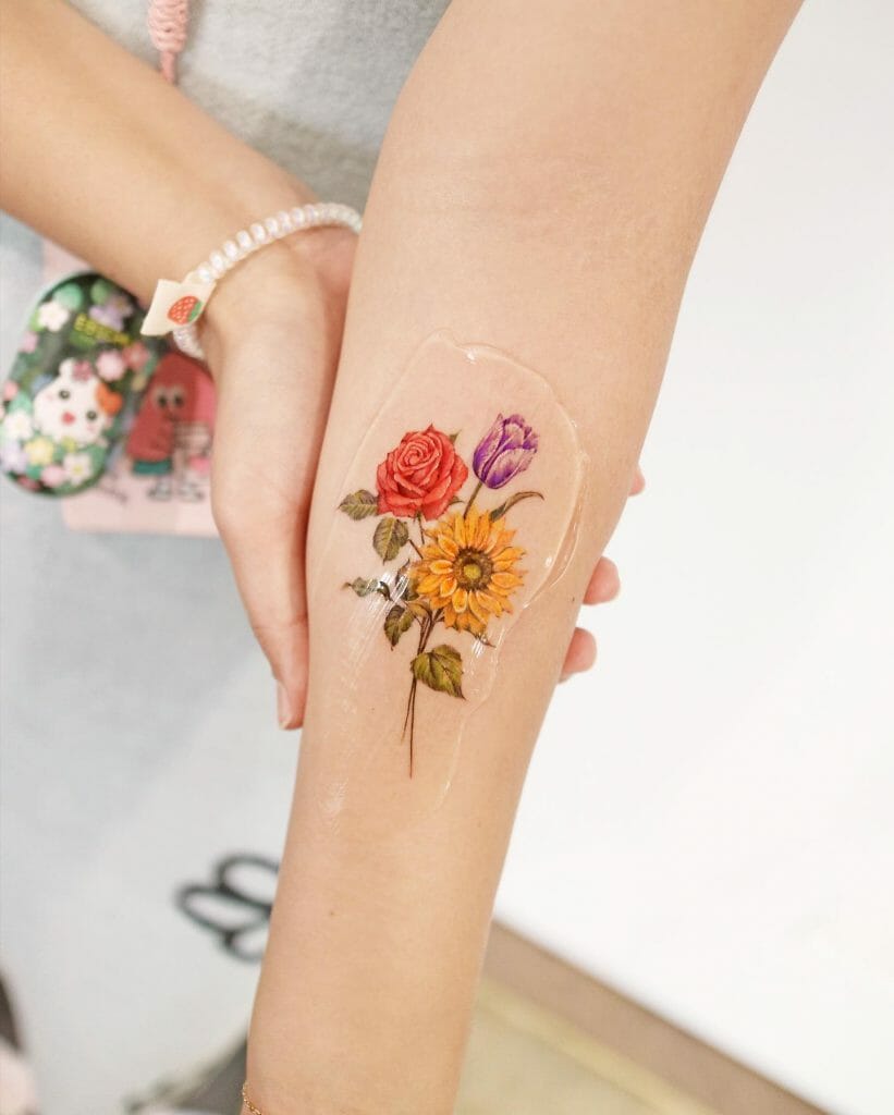 Hand Sunflower Tattoo With Rose And Tulips
