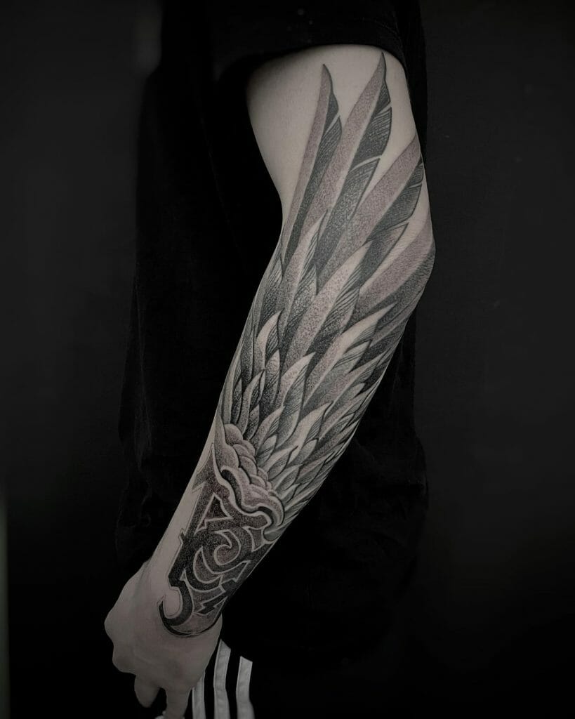 Lettered Angel Wing Tattoos With Animals