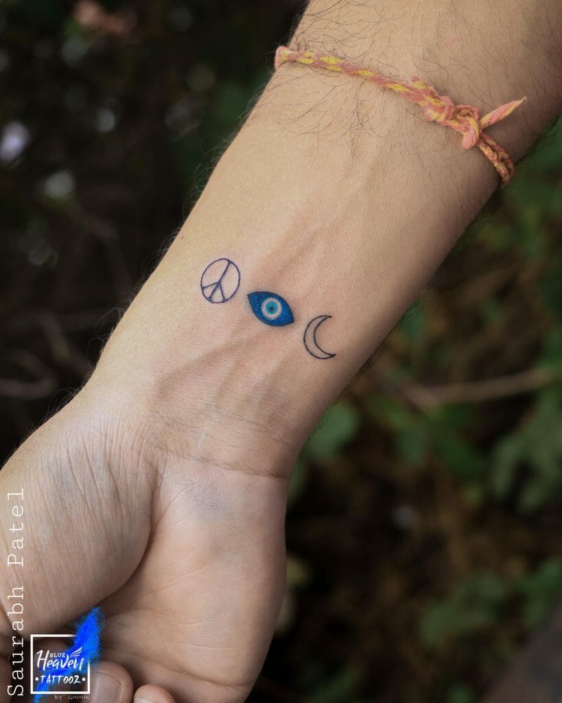 Little Blue Evil Eye Tattoo