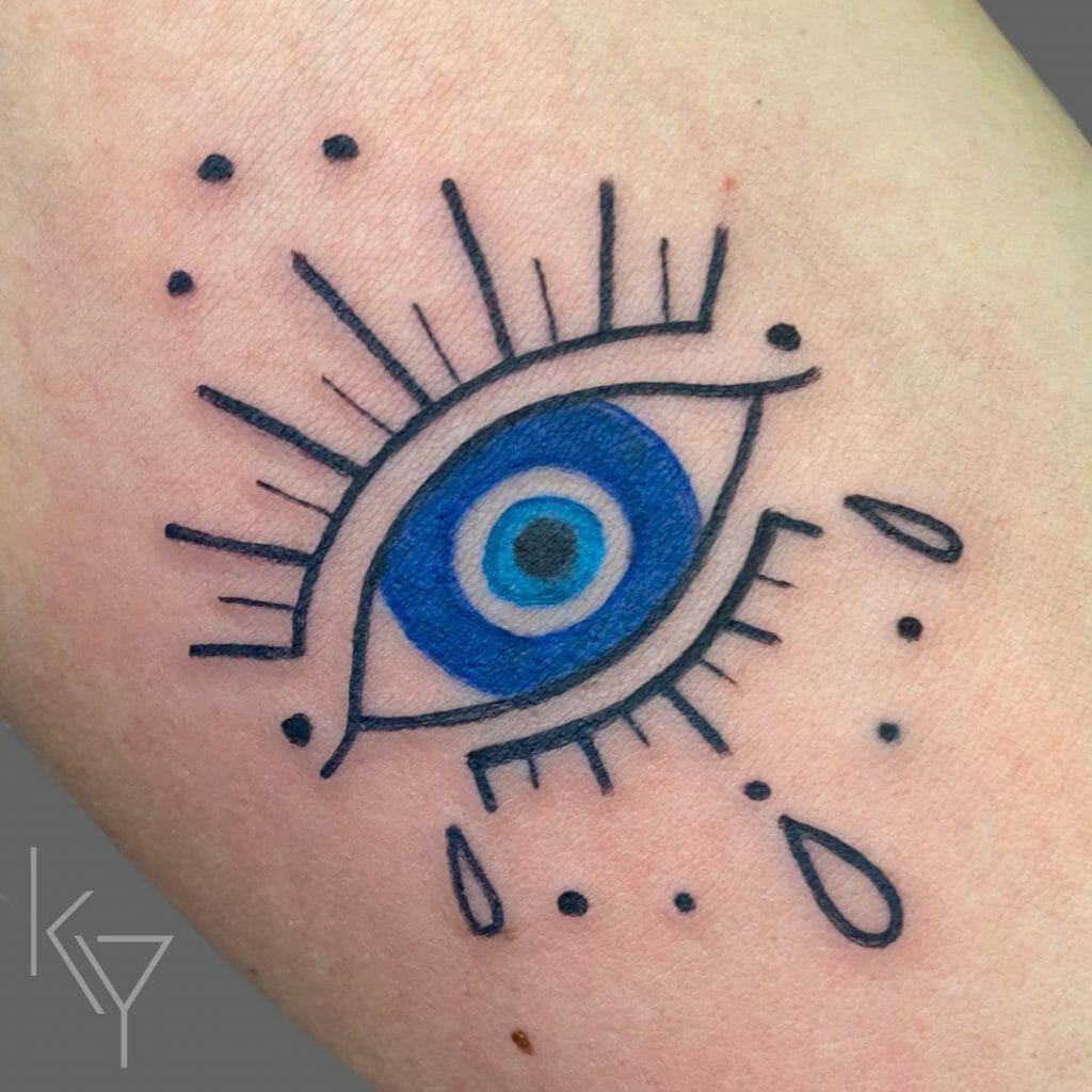 Little Blue Evil Eye Tattoos