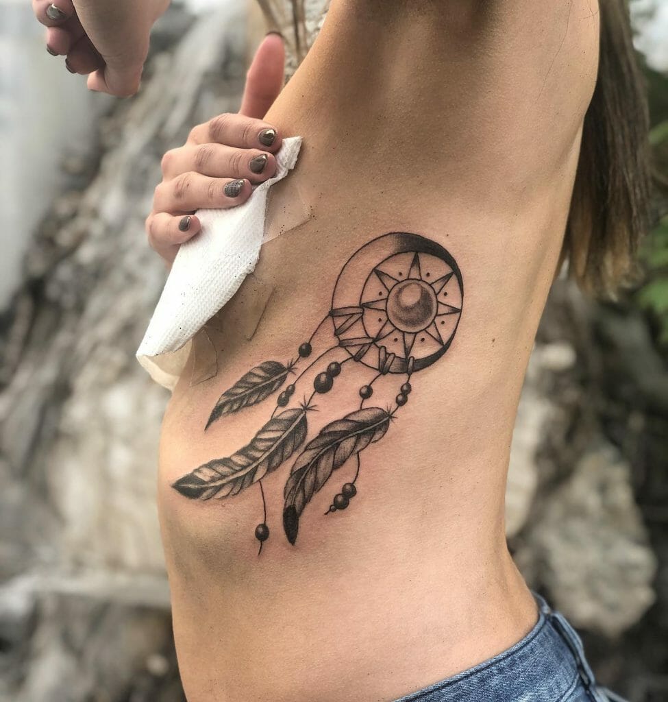 Tribal Sun And Moon Tattoo