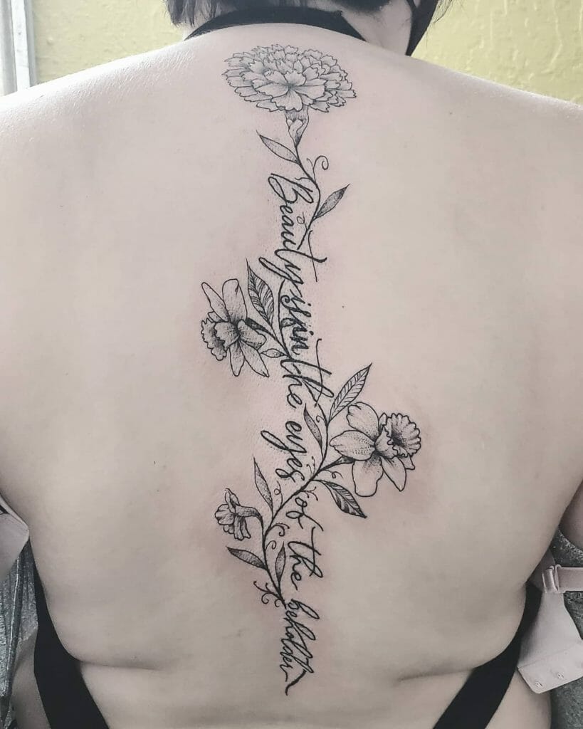 Marigold Spine Tattoo With Quote