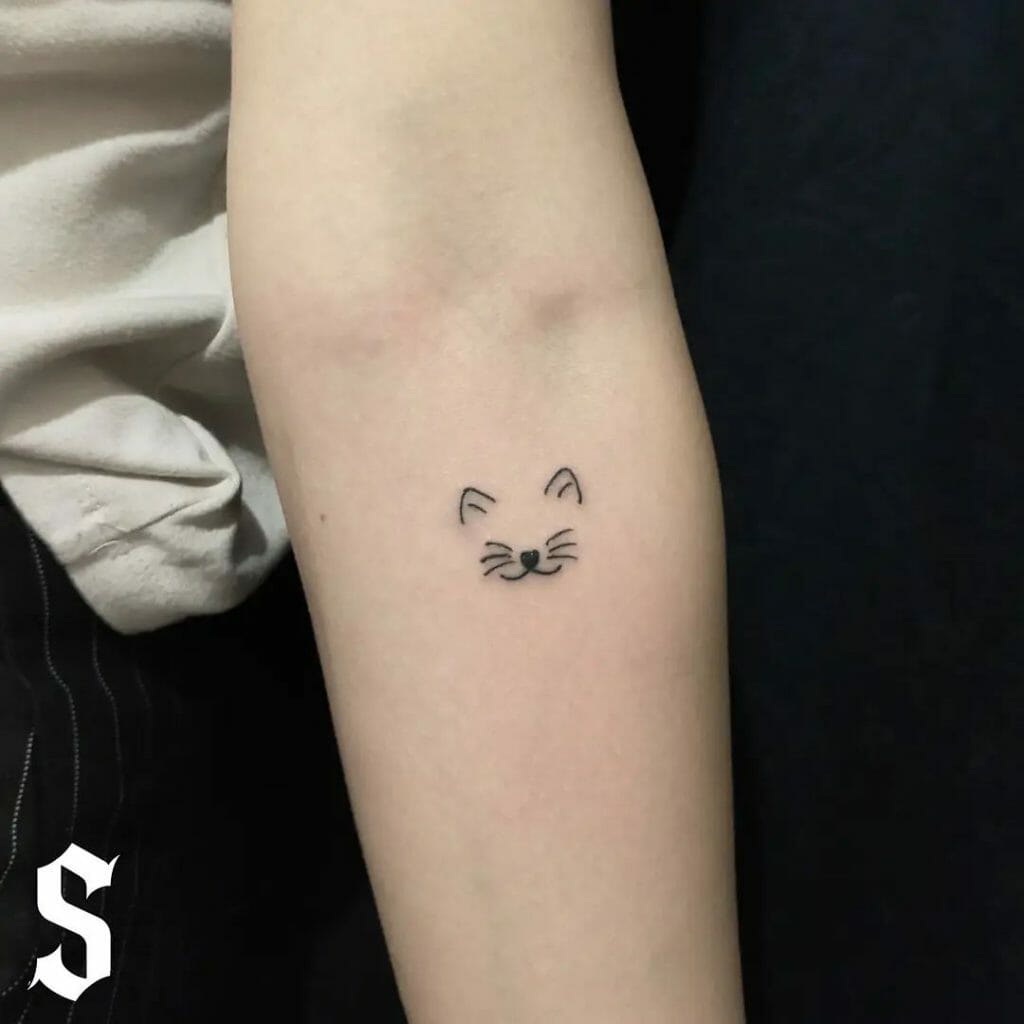 Minimalist Small Cat Tattoo