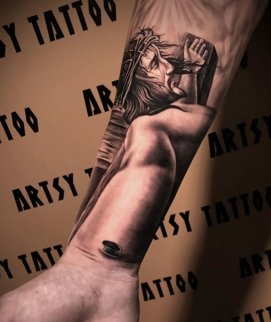 Offbeat Jesus Tattoo Forearm
