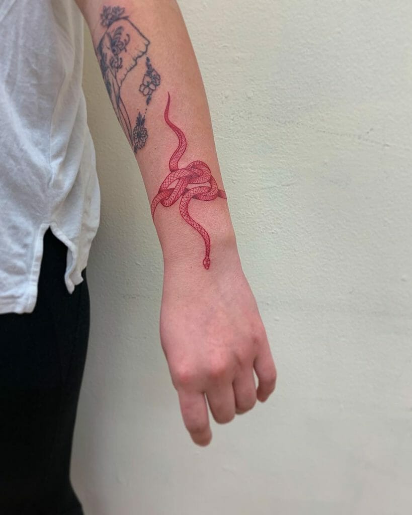 Red Ink Forearm Wrap Around Snake Tattoo