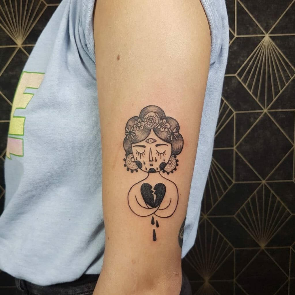Sad Woman With A Broken Heart Tattoo Design