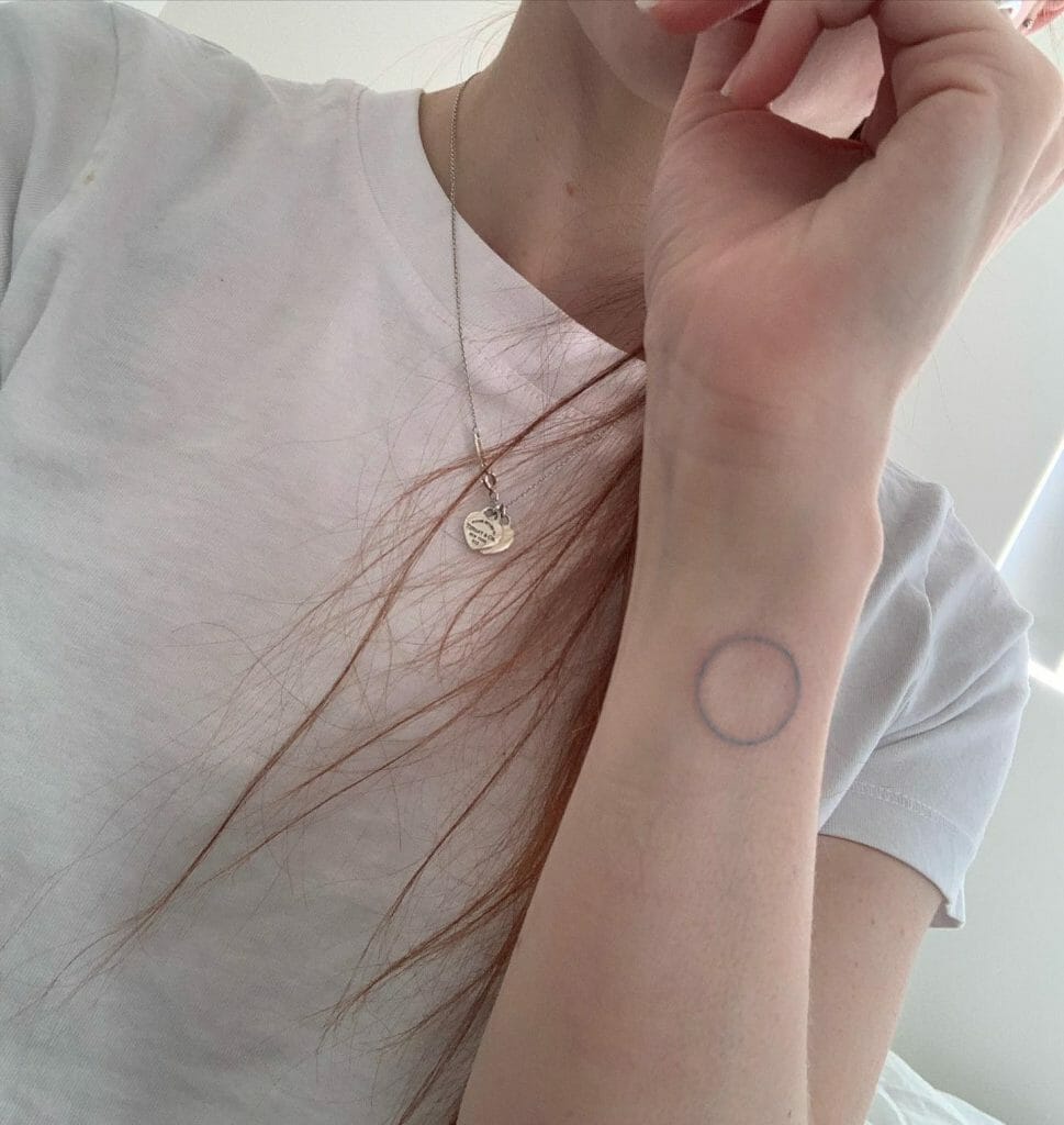 Simple Blue Circle Tattoo