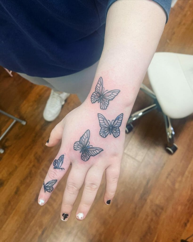 Simple Butterfly On Finger Tattoo
