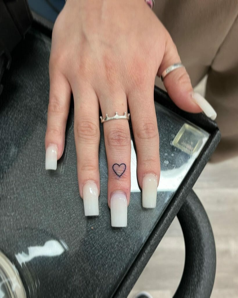 Simple Finger Heart tattoo