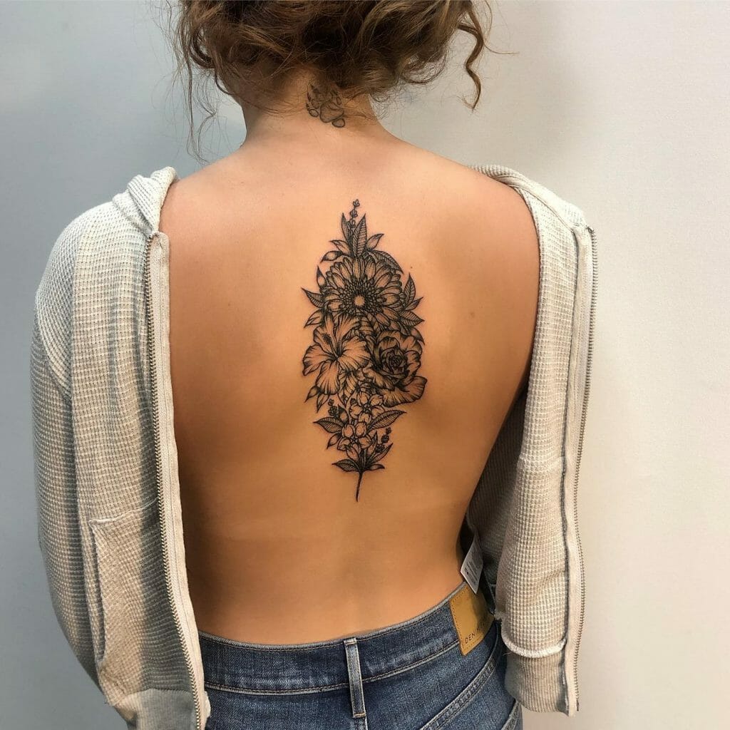 Small Back Spine Flower Bouqet Tattoo