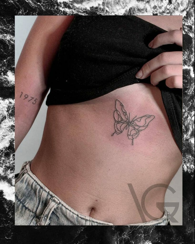Small Butterfly Rib Cage Tattoo