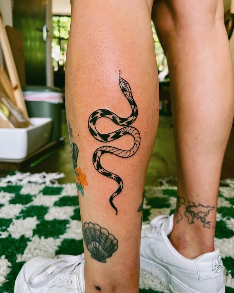 Small Size Cool Black Ink Snake On Leg Tattoo