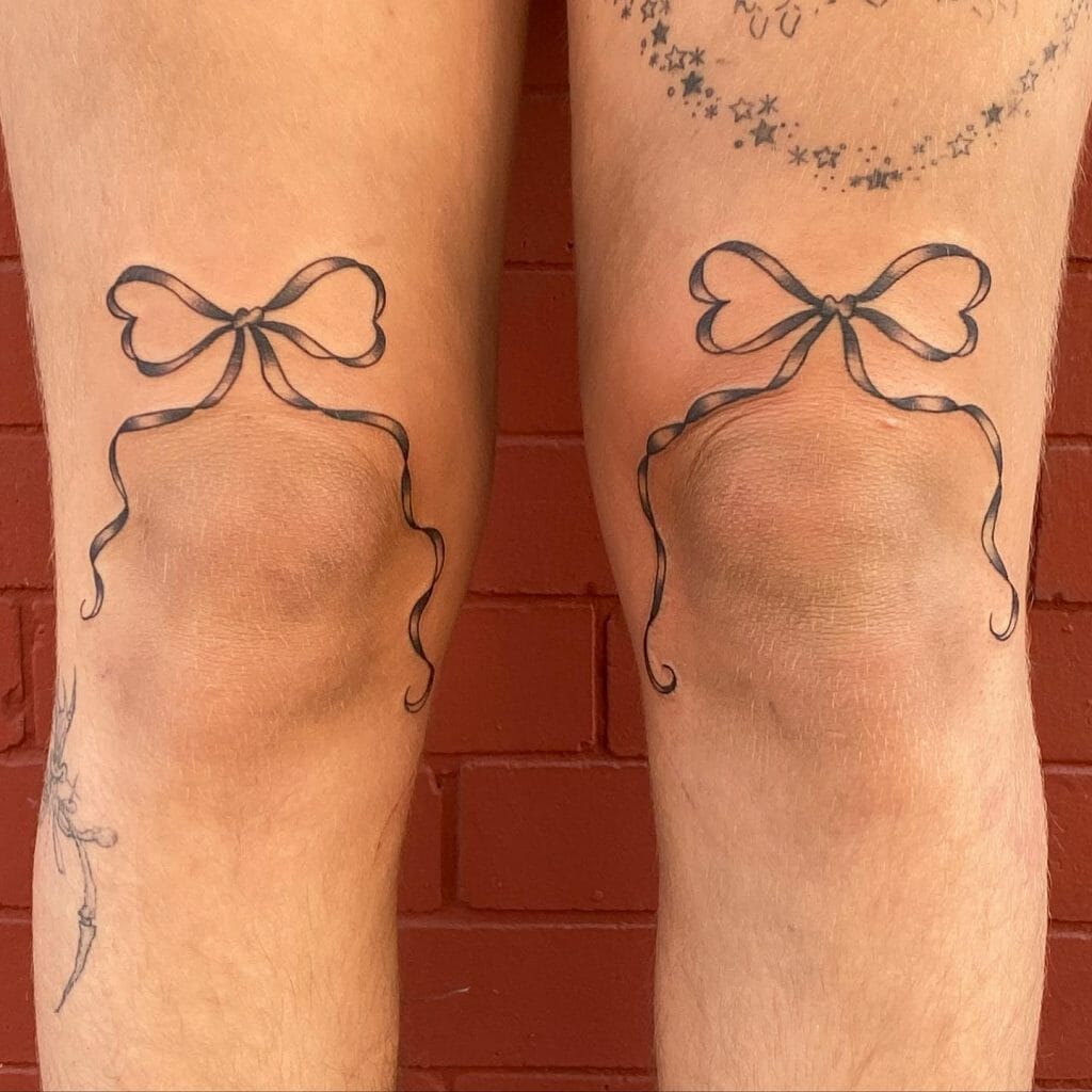 Thin Ribbon Bow Tattoo On Both Thighs