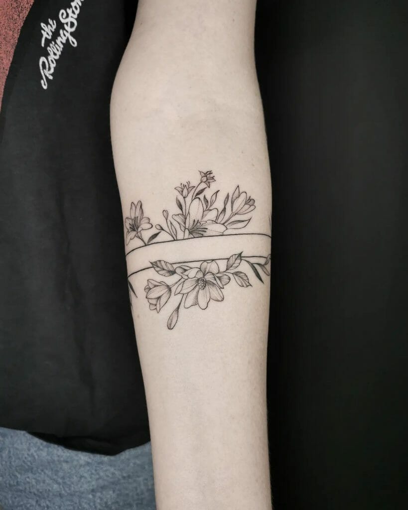Unconventional Magnolia Flower Tattoo Design In The Style Of An Armbands