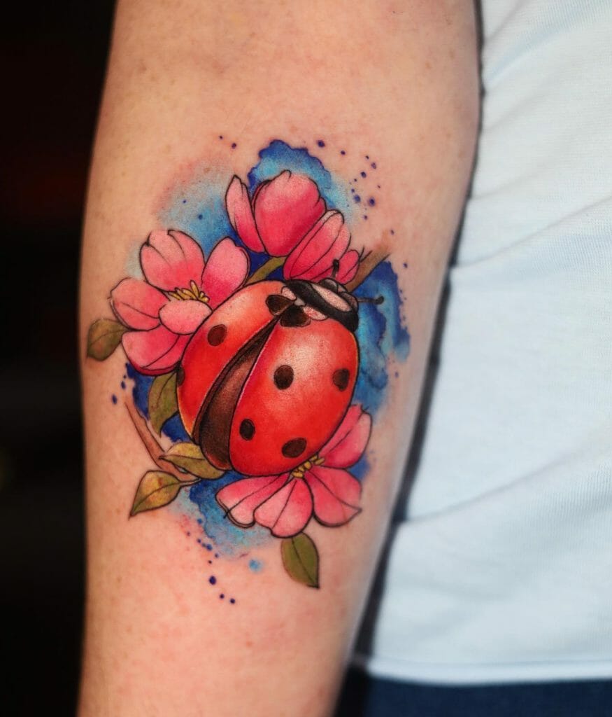 Watercolor Ladybug Tattoo On Forearm