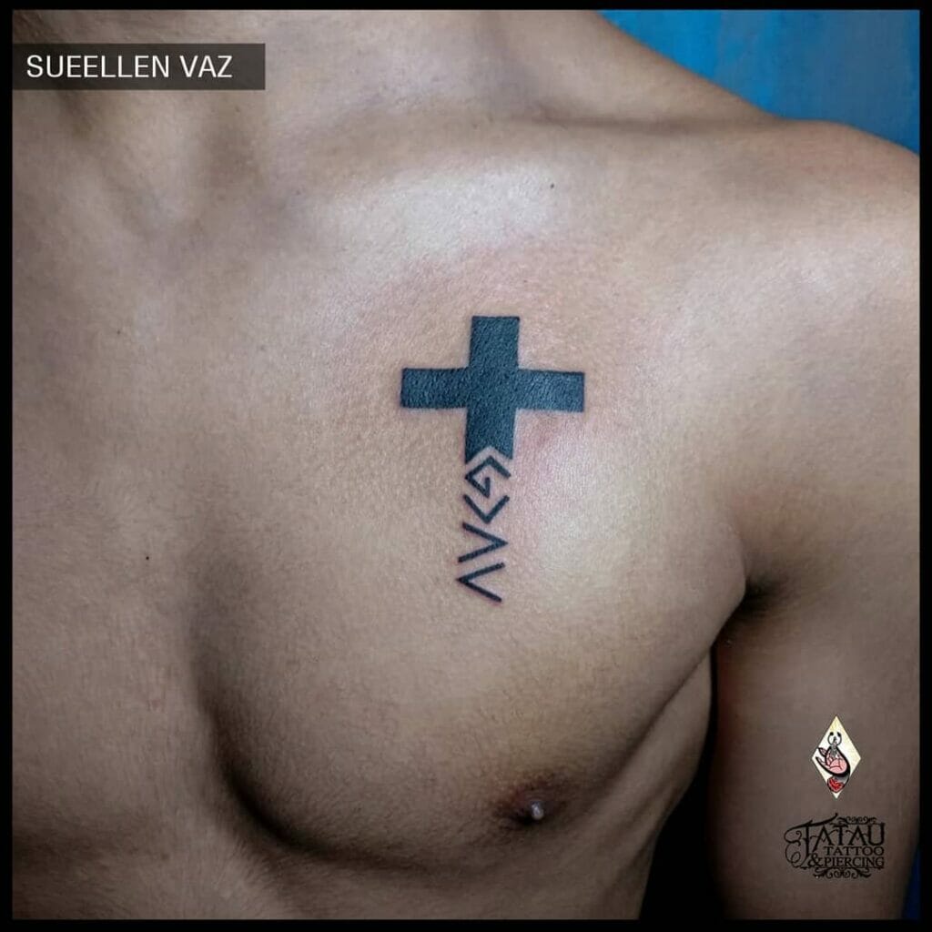 Small Cross Tattoo On Chest
