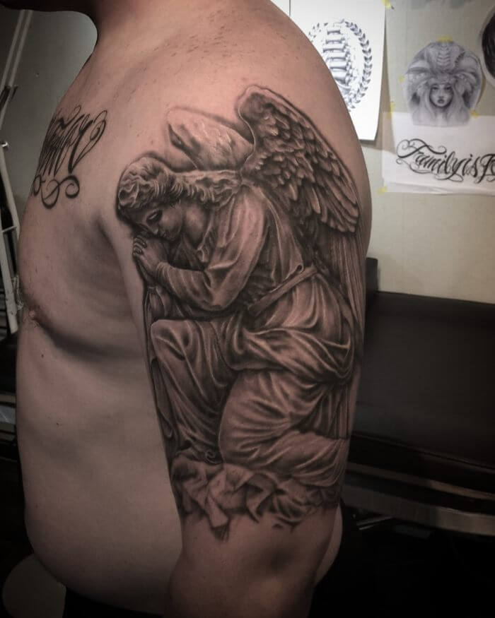 The Kneeling Down Guardian Angel Tattoo