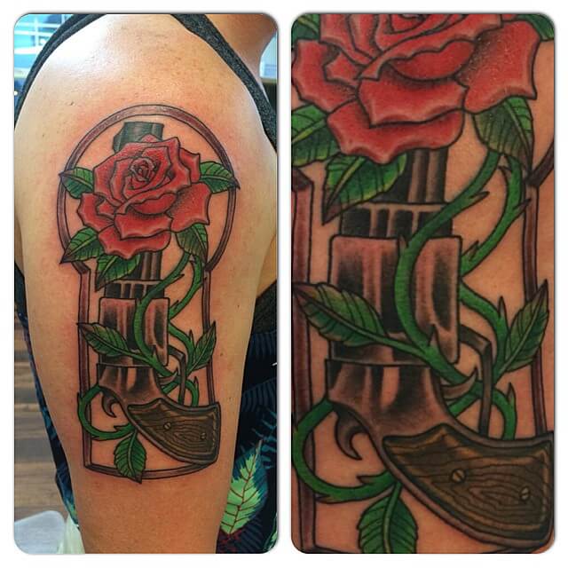 Gun And Roses Tattoo On ArmGun And Roses Tattoo On Arm