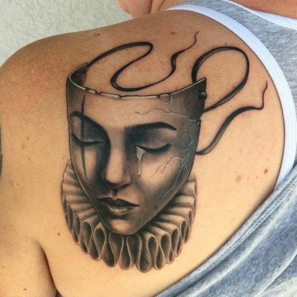 Left Upper Back Realistic Sad Mask Tattoo Ideas