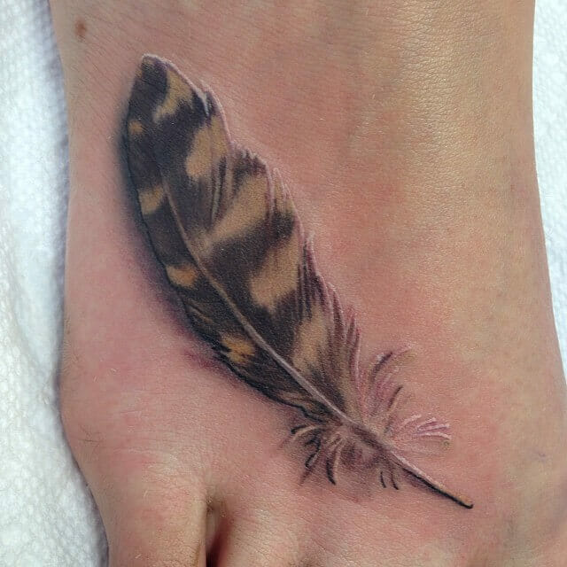 Realistic Owl Feather Tattoo