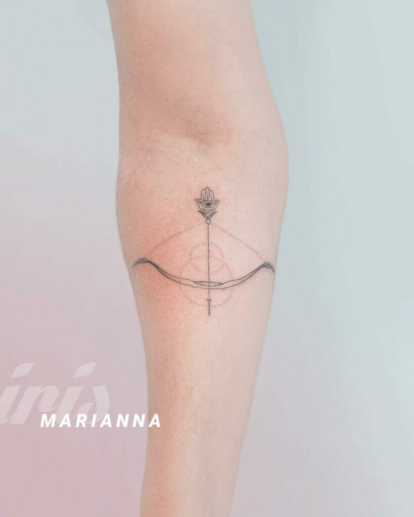 Minimalist Bow And Arrow Tattoo In Black And White