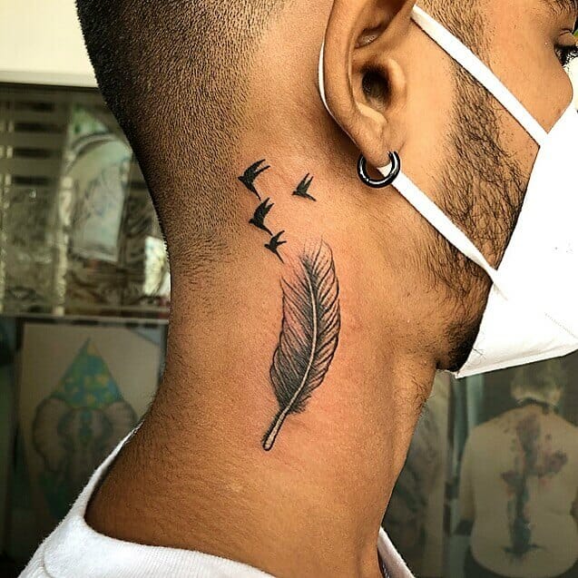 Small Bird Tattoo With Feather