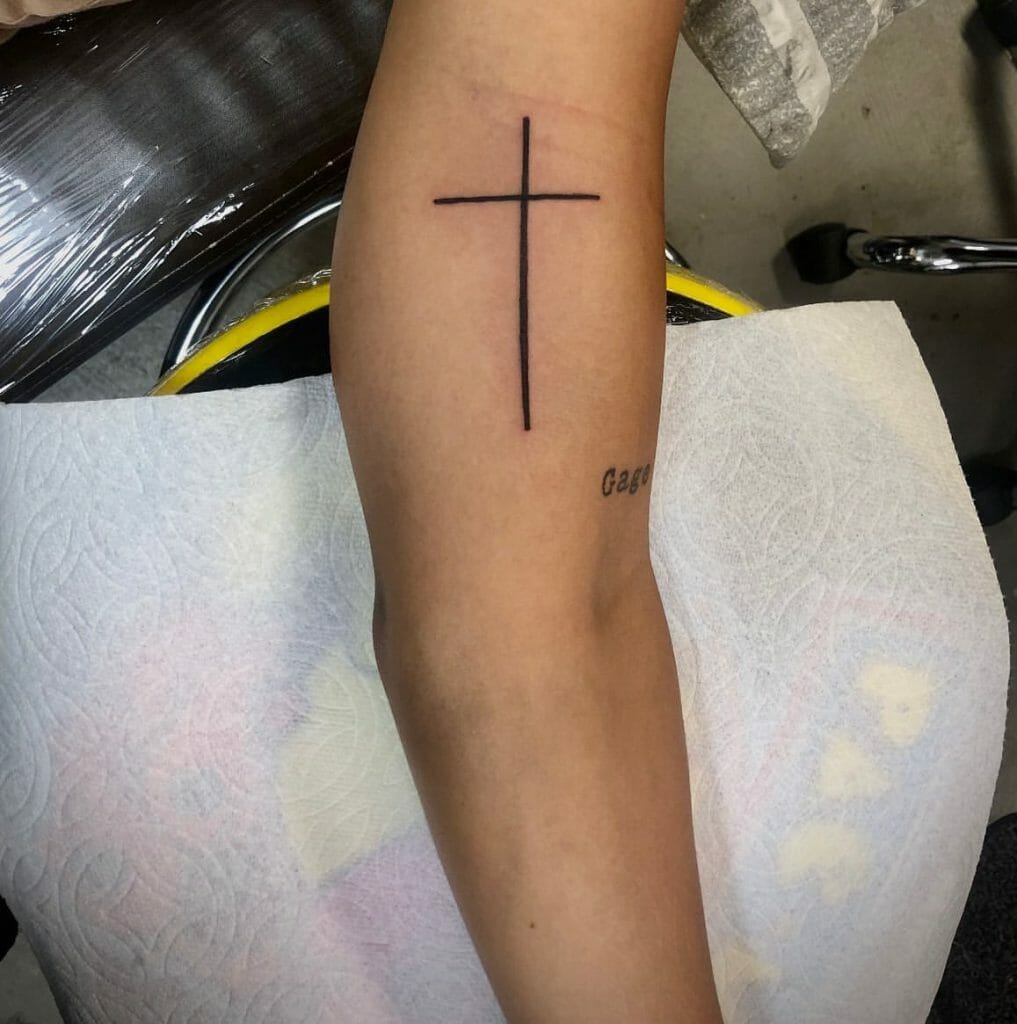 Dainty Cross Tattoo