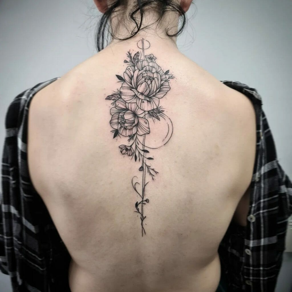 Fine Line Spine Tattoo