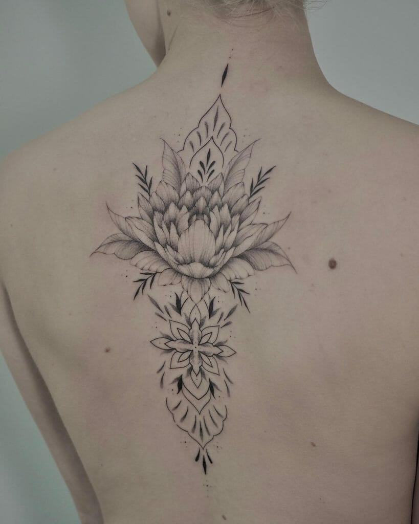 Lotus Flower Spine Tattoo