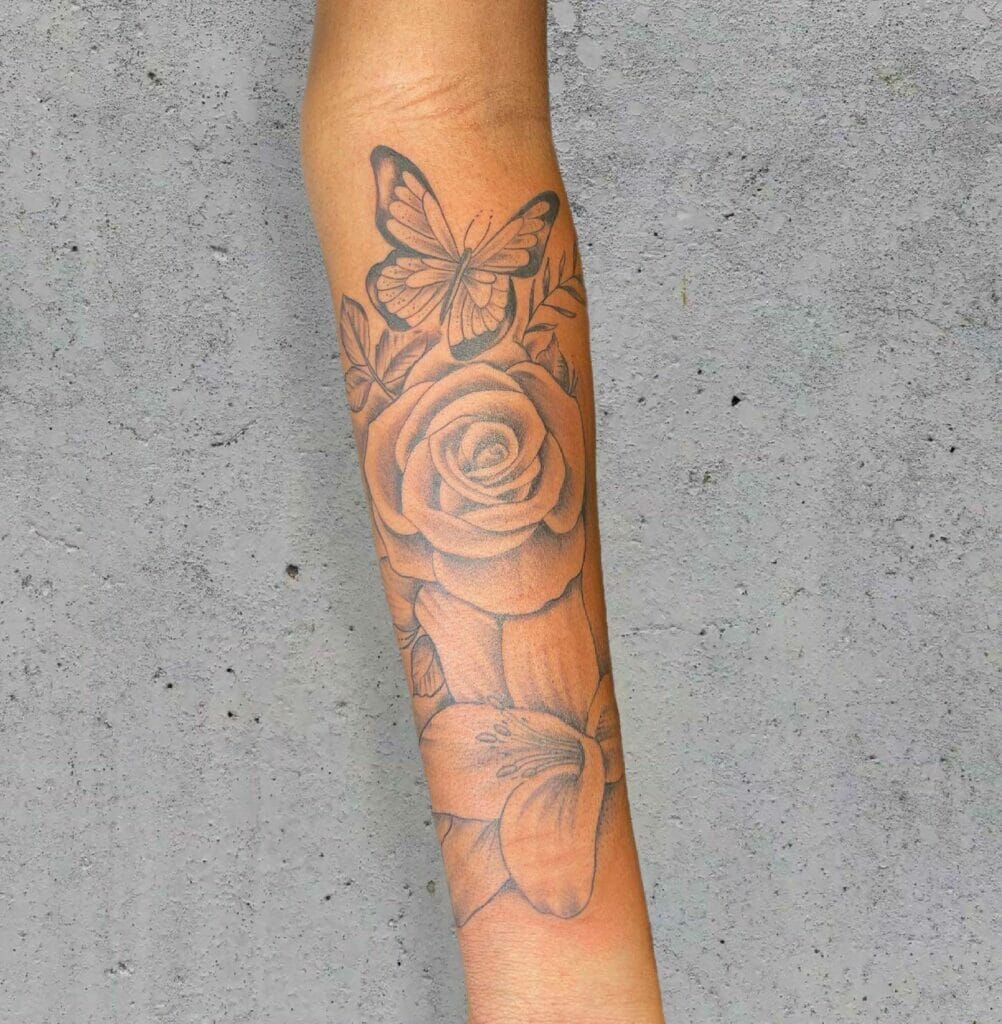 Butterfly And Rose Arm Tattoo