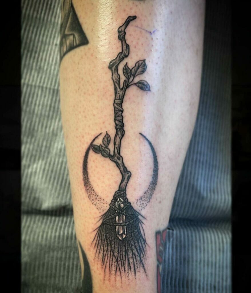 Witch Broomstick Tattoo With Twigs And A Crescent Moon