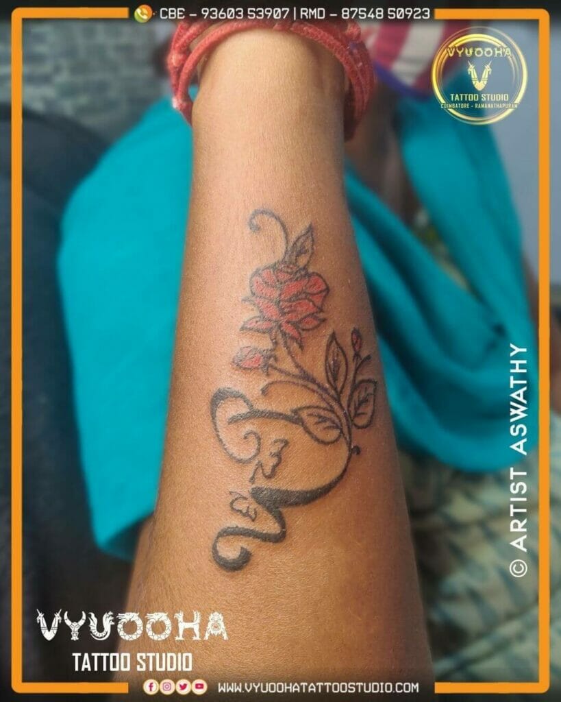 Creative Hidden Name Rose Tattoo On Arm
