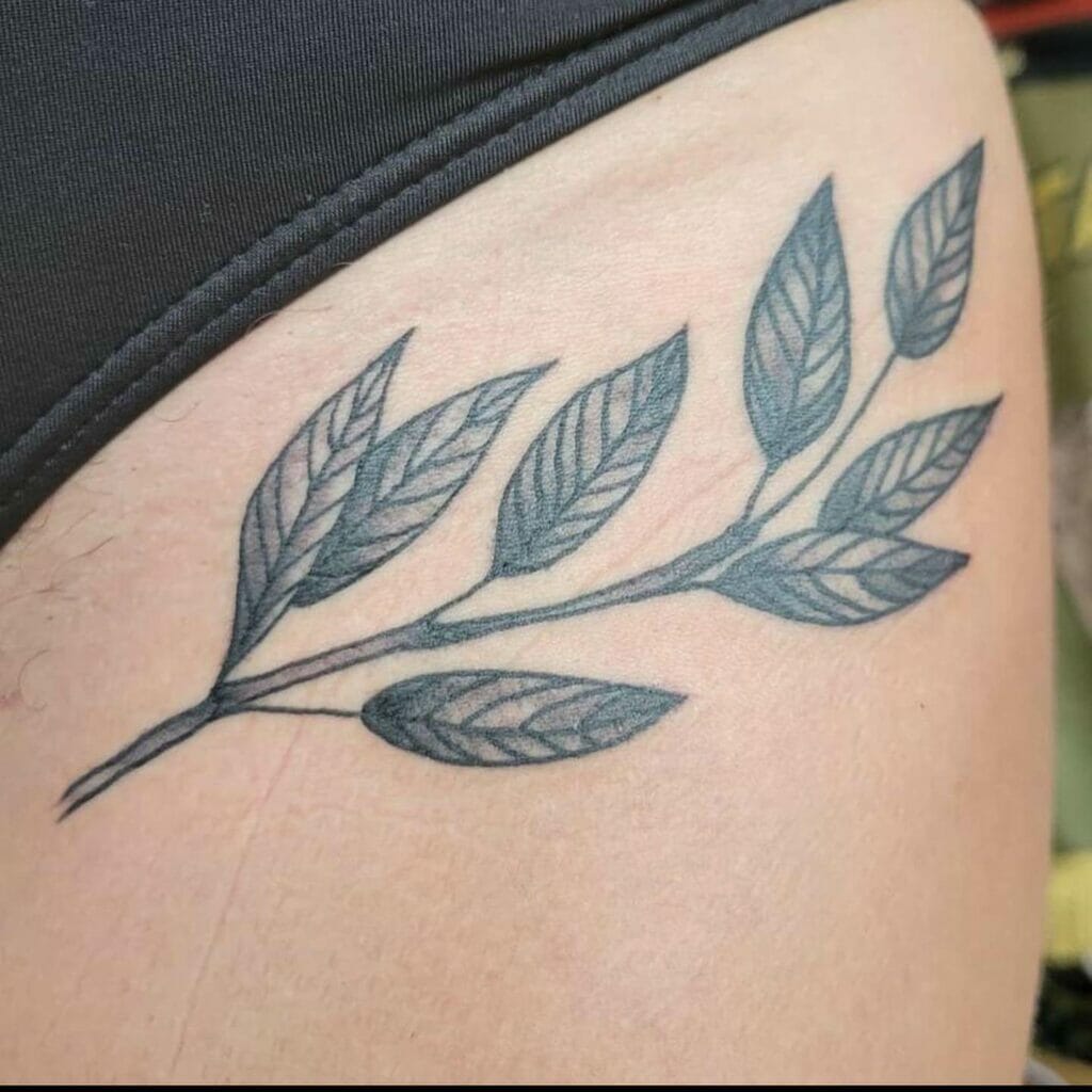 Leaf And Fern Bikini line tattoo