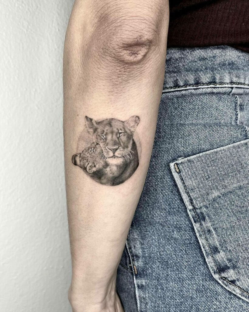 Realistic Lioness And Cub Tattoo