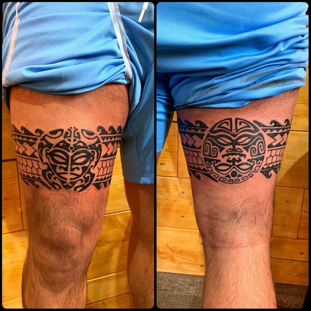 Leg sleeve tribal tattoo