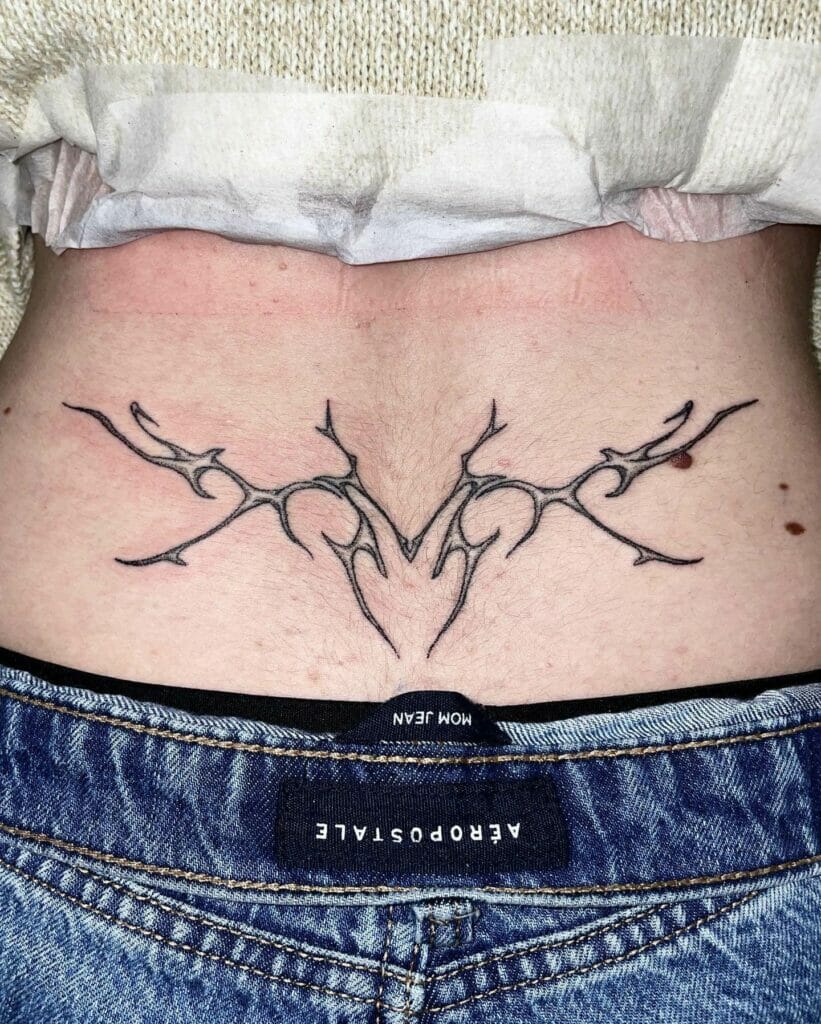 Neo-Tribal Lower Back Tattoo