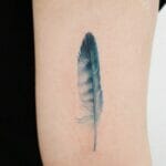 Female Feather Tattoo